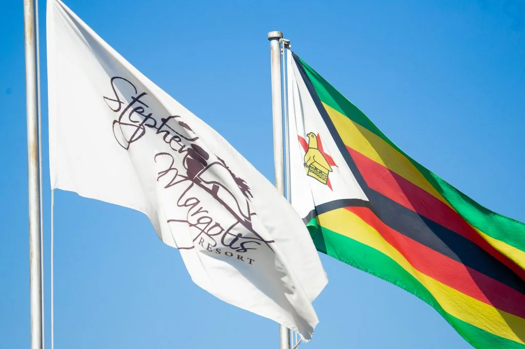 Stephen Margolis Resort and Zimbabwe flags